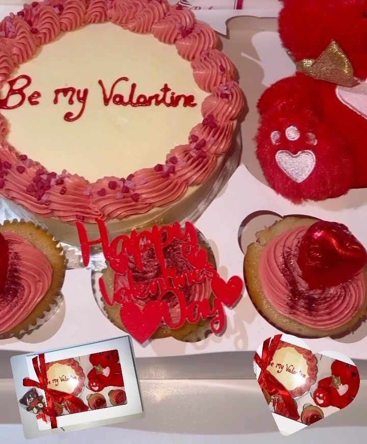 A Valentine's gift box with a heart cake, cupcakes and a teddy